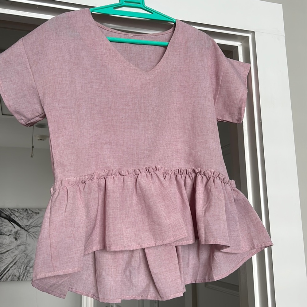 Pink peplum top